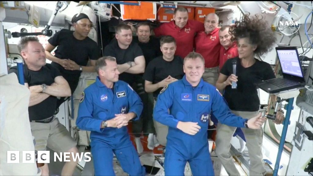 Joyful welcome by stranded astronauts for SpaceX capsule crew