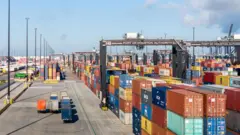 US ports brace for shut down as dockworkers strike