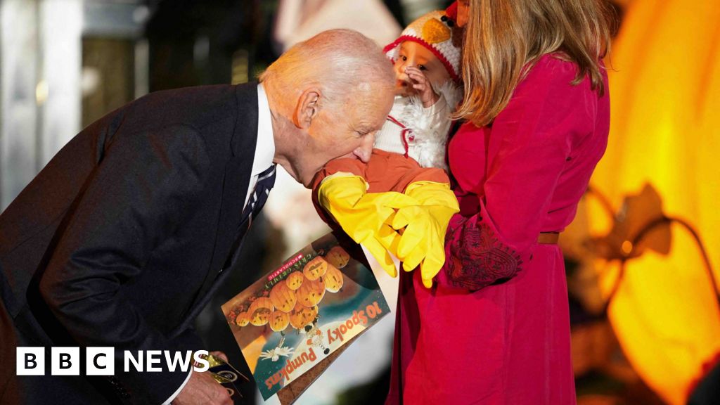 Watch: Biden playfully bites baby during White House trick or treat event