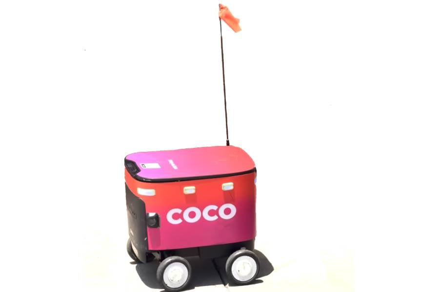 "Globotics": Robots Move Into Delivery, Medicine, Construction And Defense 1 Coco autonomous delivery robot on a city sidewalk as robots move into everyday urban life