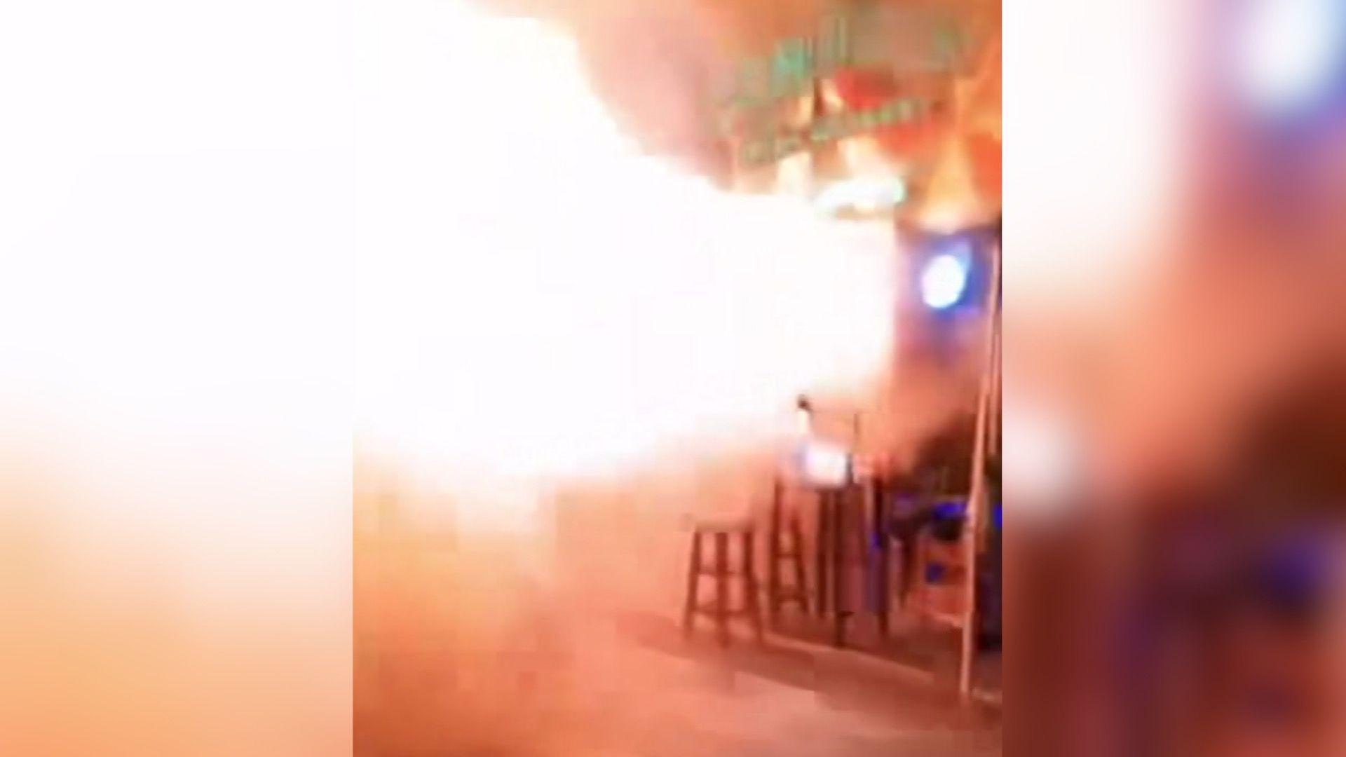 A still from a video showing a fireball shooting out of the venue