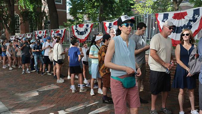 People queuing up outside Independence Hall after news that the Salute to Independence Semiquincentennial Parade has been cancelled