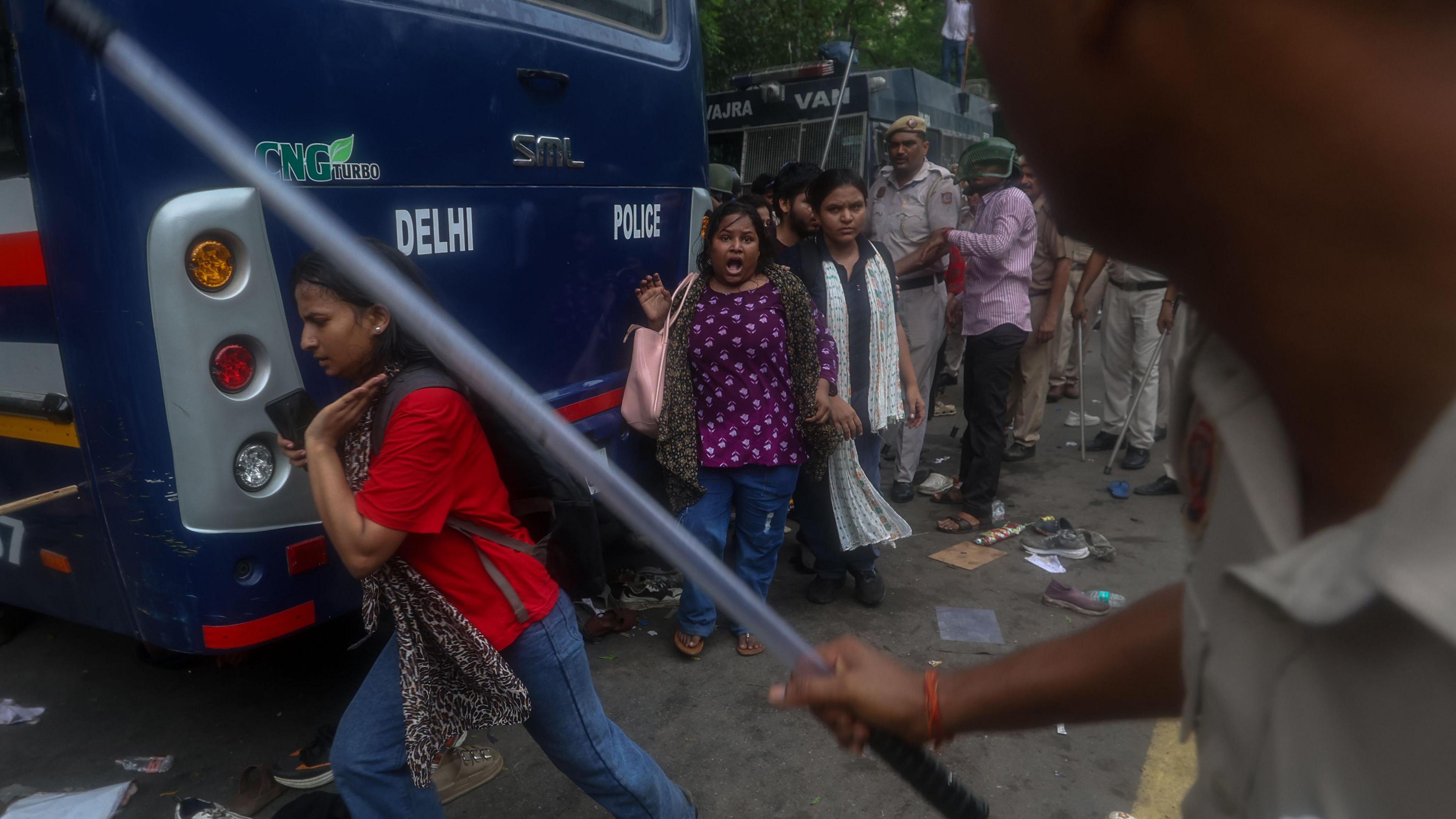 Indian security personnel use lathi charge as they attempt to stop Cockroach Janta Party's(CJP) supporters during a march toward Parliament in New Delhi, India, 20 July 2026. Demonstrators from the youth-led political movement gathered to demand the resignation of the Union Education Minister over examination paper leak irregularities, following the court-ordered medical evacuation of activist Sonam Wangchuk, according to statements from the Delhi Police.