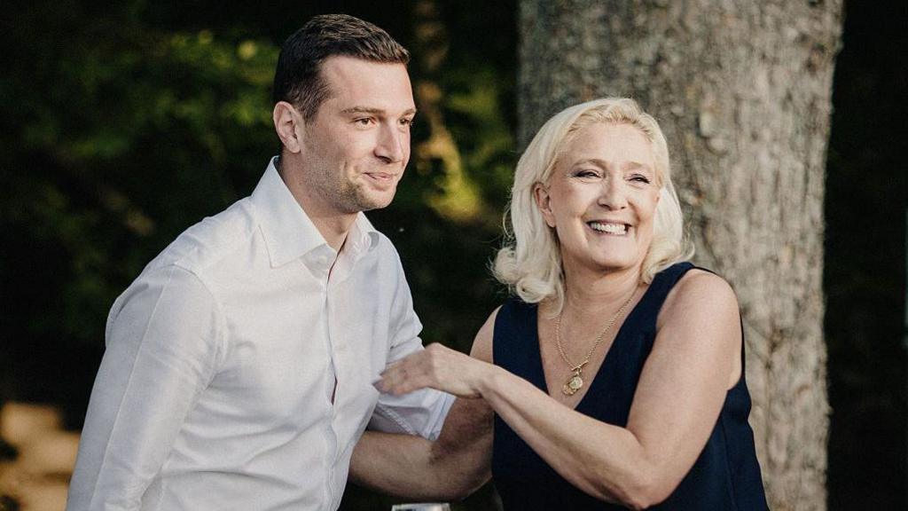 FRANCE-POLITICS-PARTIES-RN-LIEVIN
Marine Le Pen president of the Rassemblement National RN parliamentary group smiles at the end of her speech alongside Jordan Bardella president of the Rassemblement National RN political party during a Fete champetre an event organised by the Rassemblement National RN in Lievin France on 4 July 2026