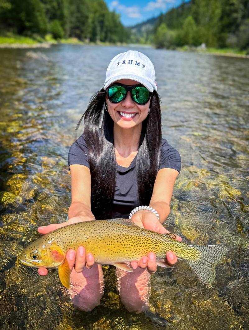 Nathalie Guasis on a Year in Montana 1 Nathalie Guasis holding a trout in a Montana river