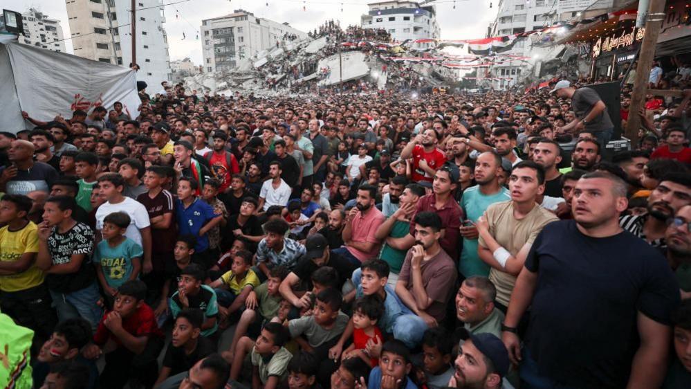 Palestinians in Gaza City watch a World Cup match between Argentina and Egypt. Photo: 7 July 2026