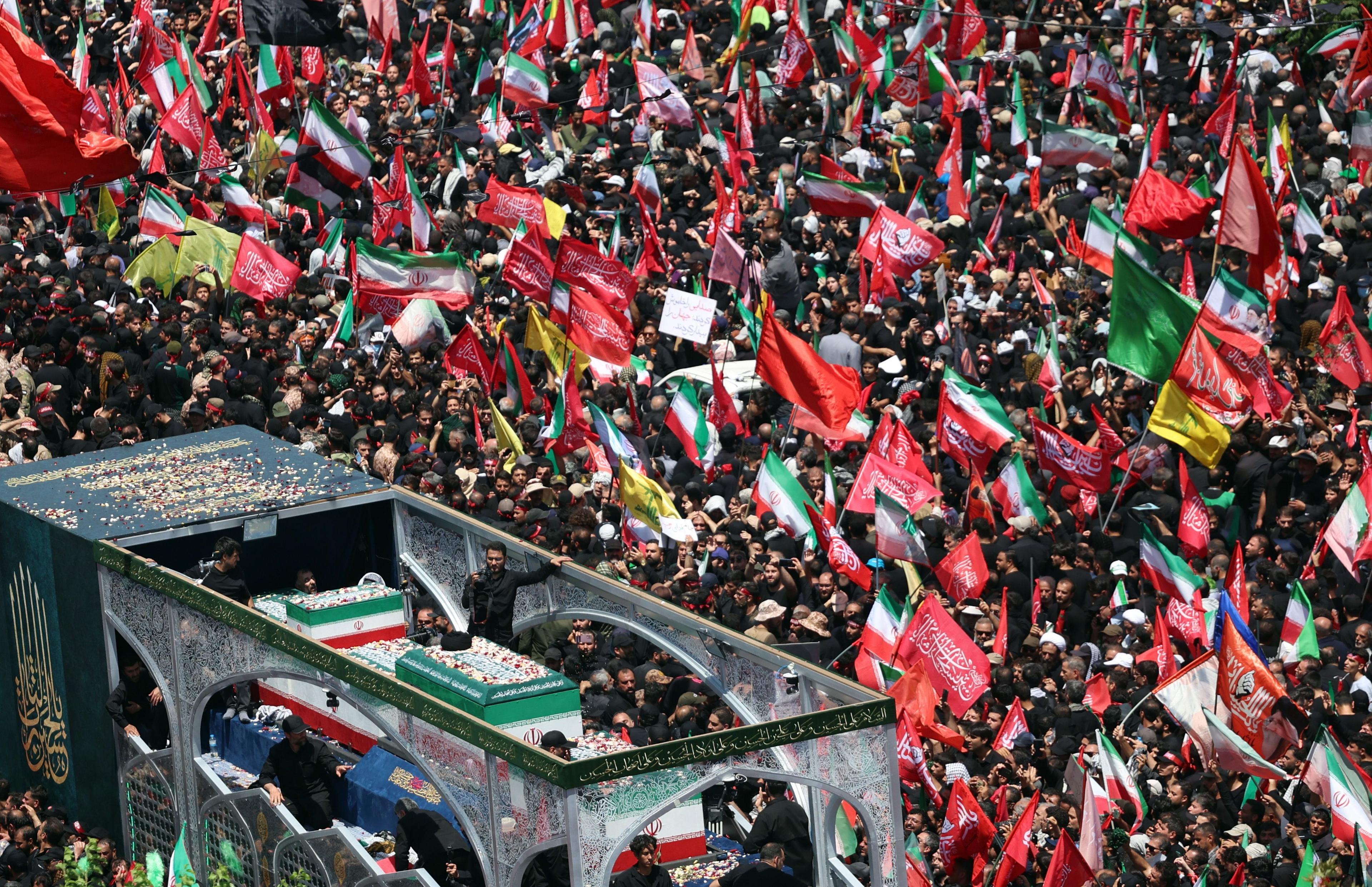 Iranians taking part in the funeral procession for Ayatollah Ali Khamenei