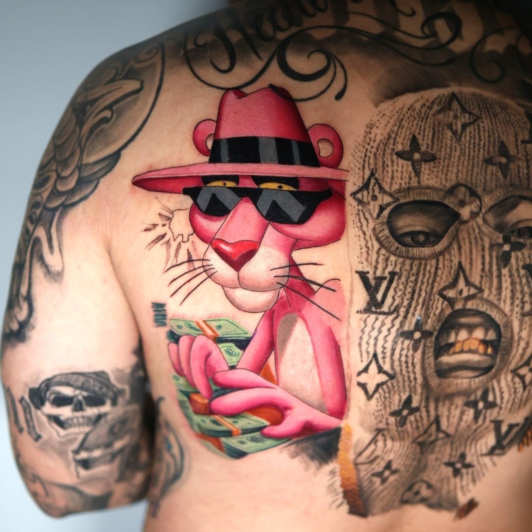 Tattoo Artist Natacha Rios On Elevating Fan Culture Into Fine Art 2 Custom color realist back piece of the Pink Panther by tattoo by Natacha Rios