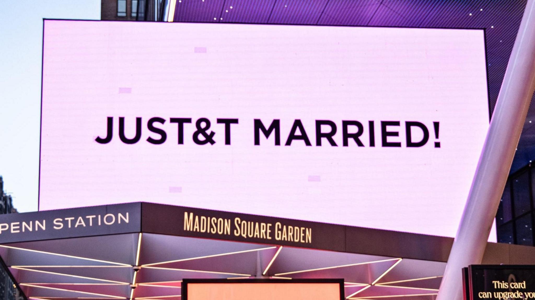 Madison Square Garden is lit in pink and displays a sign reading 'JUST&T MARRIED' during Taylor Swift and Travis Kelce's wedding celebration in New York, New York, USA, 3 July 2026.