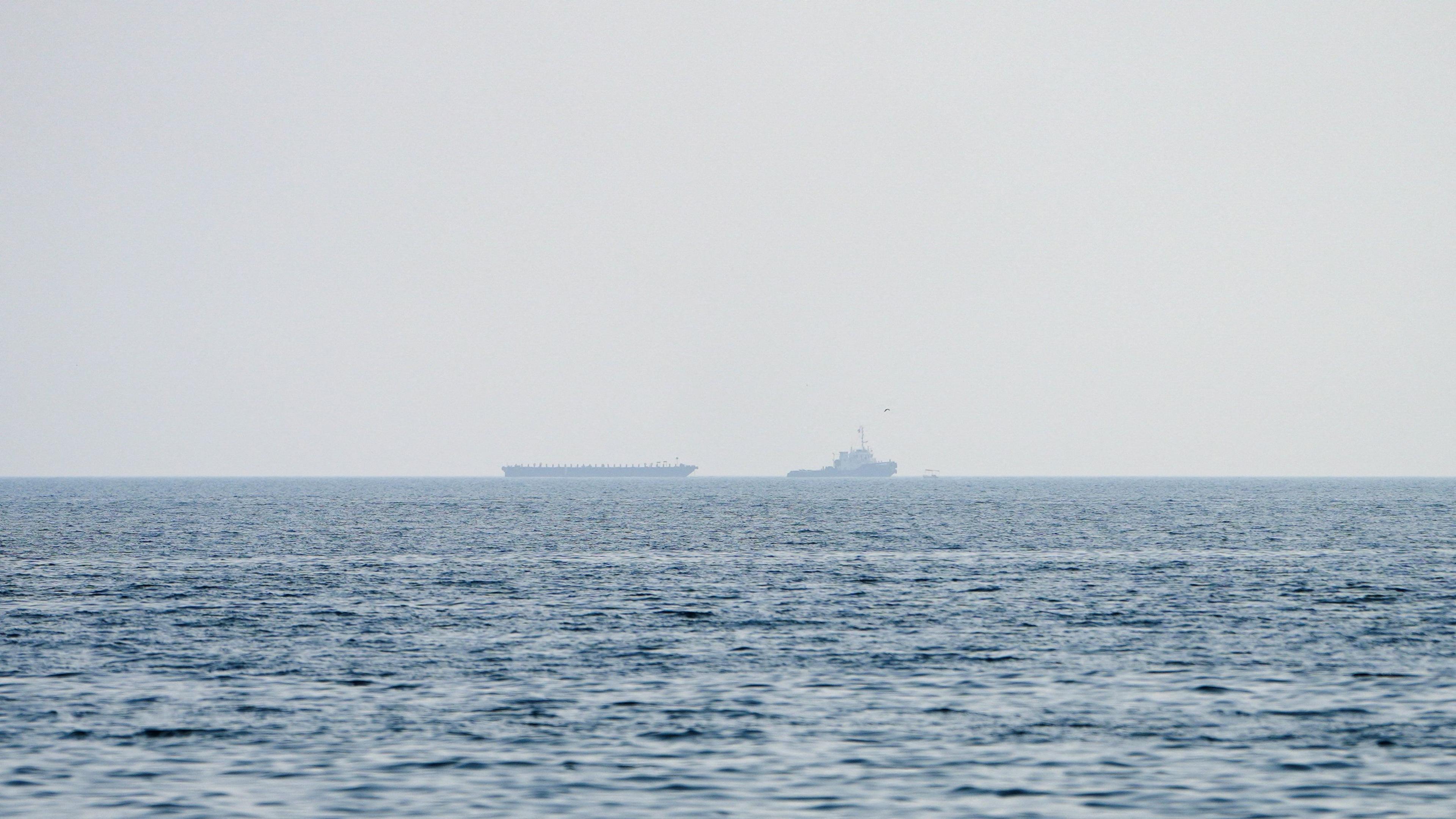 Vessels float in the Strait of Hormuz.