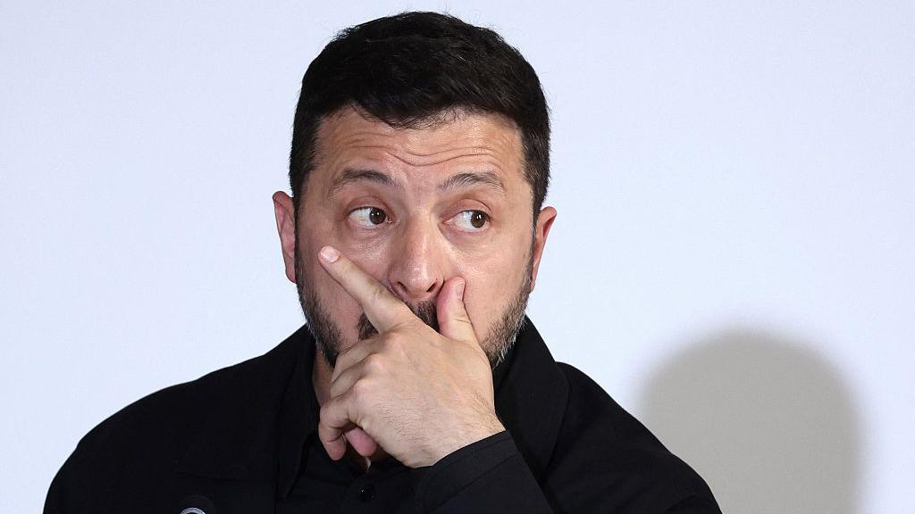 Ukraine's President Volodymyr Zelensky takes part in a summit of the Coalition of the Willing to support Ukraine at the Hotel des Invalides in Paris on July 13, 2026.