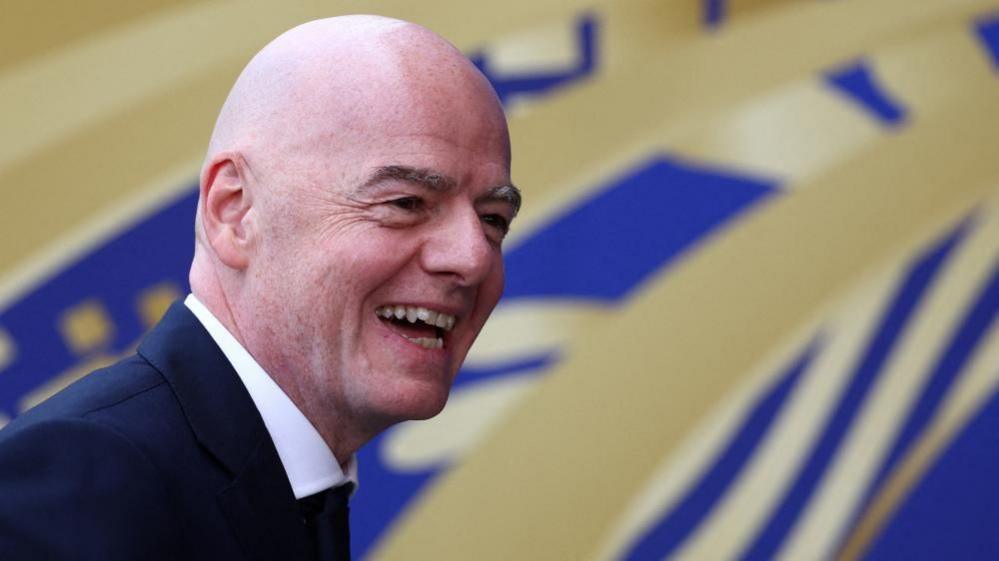 Fifa president Gianni Infantino smiles to the camera
