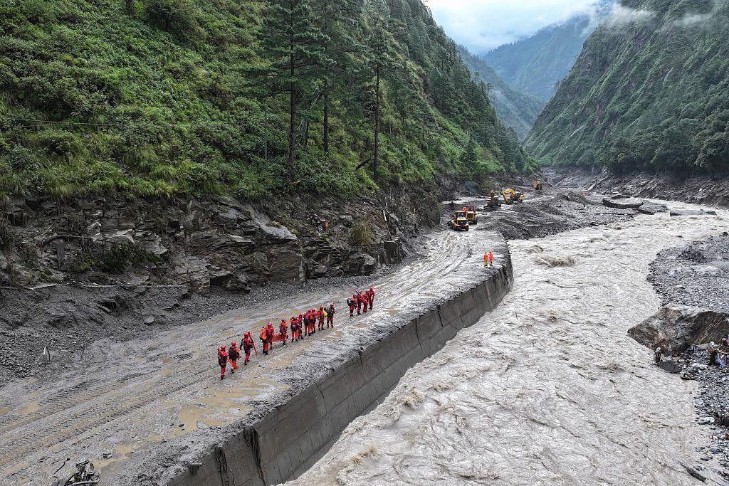 Rescue workers operating in Shigatse in Tibet after devastating flooding and landslides
