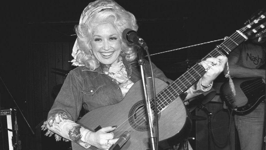 Dolly Parton, pictured in black and white, rehearsing for her New York nightclub debut at the West Village's Bottom Line in 1977