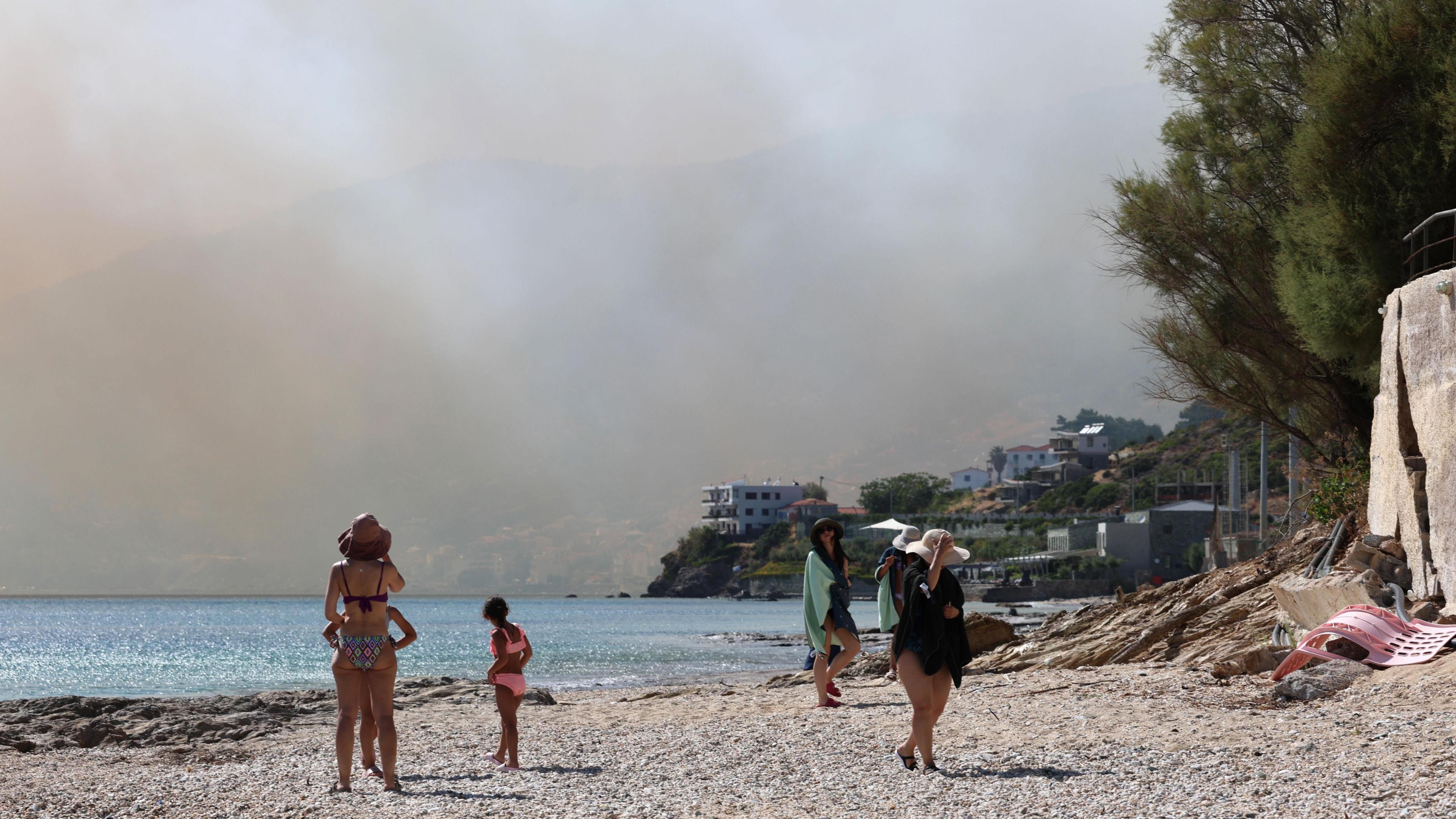 Smoke fills the sky as a fire burns through mixed agricultural and forest land in Plomari, Lesvos, Greece, 29 July 2026