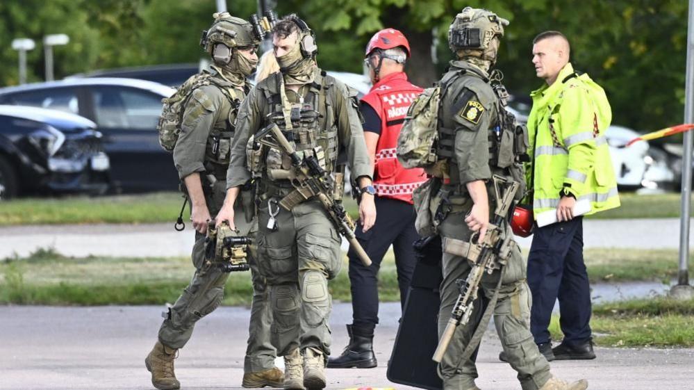 Armed police officers at the scene of the Sweden school shooting