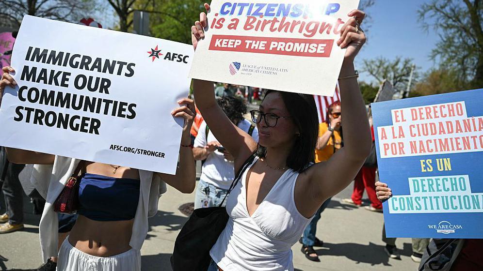 Demonstrators rally in support of birthright citizenship outside the US Supreme Court in Washington, DC on April 1