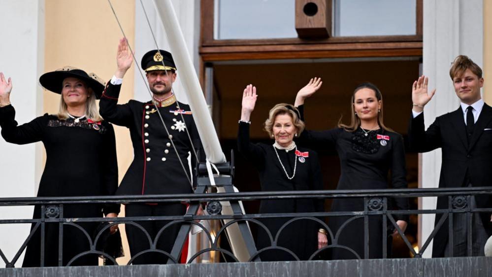 Norway's King Haakon, Queen Mette-Marit, Prince Sverre Magnus, Crown Princess Ingrid Alexandra and Queen Sonja wave to the crowd from the balcony of the royal palace in Oslo