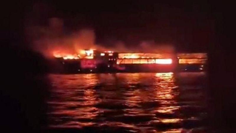 MV June Aster burns as flames and smoke rise after a fire broke out on the ferry