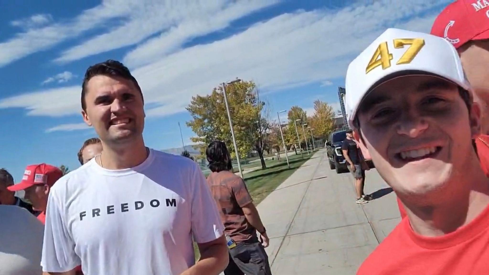 Charlie Kirk poses for a selfie with Jeb Jacobi