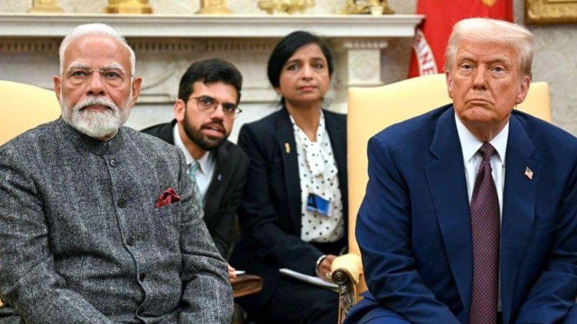 Donald Trump, wearing a grey jacket, and Narendra Modi, wearing a grey jacket, at a White House event in February 2025