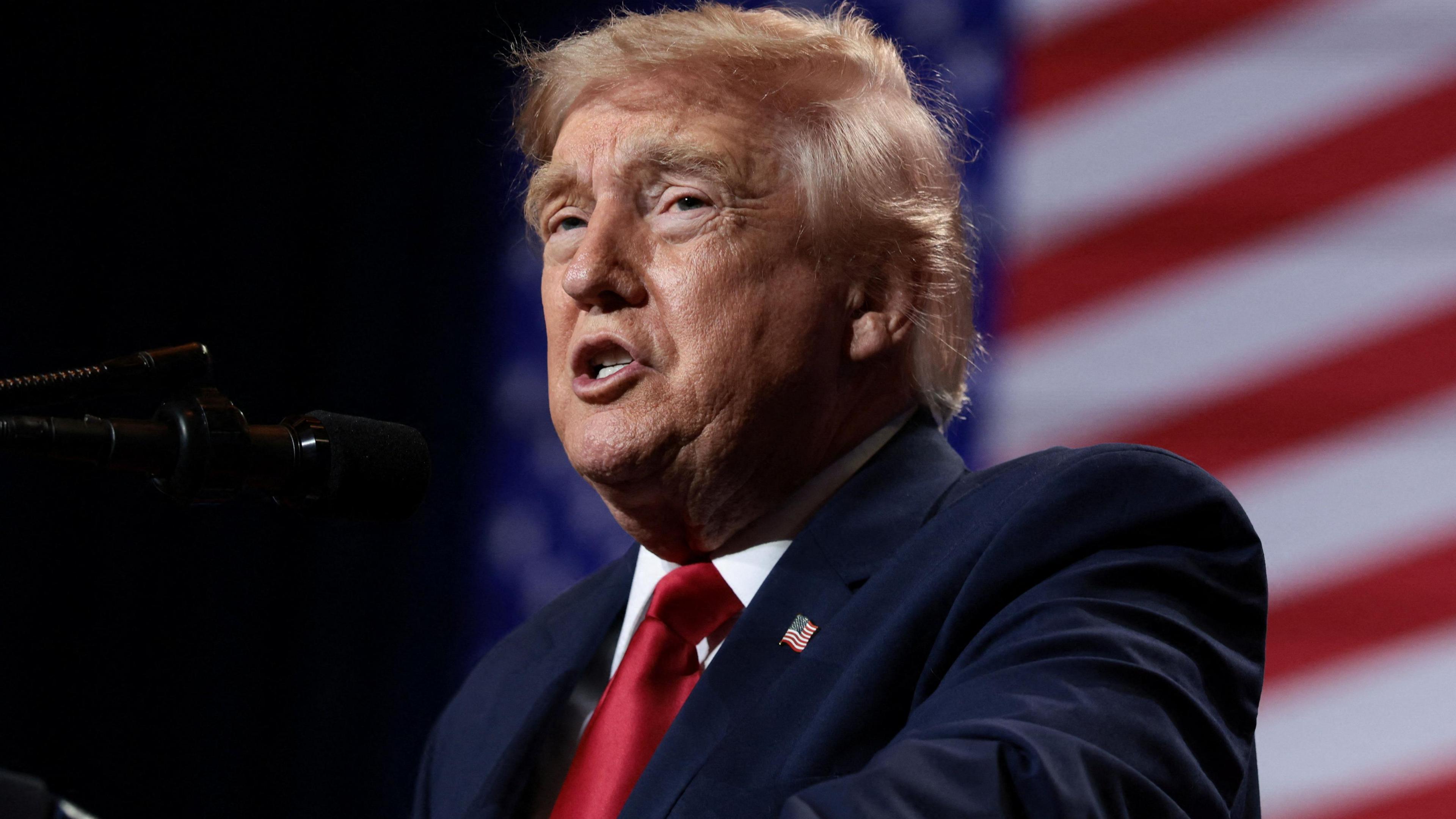 U.S. President Donald Trump delivers remarks at Red Rock Casino Resort Spa in Las Vegas, Nevada, U.S., August 5, 2026. It is a head-and-shoulders shot and he is wearing a blue jacket and shiny red tie.