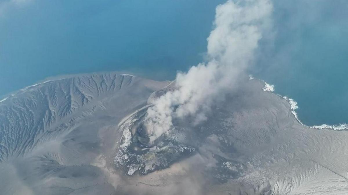 Mount Anak Krakatau spewing volcanic materials into the air following an eruption in Sunda Strait, Indonesia