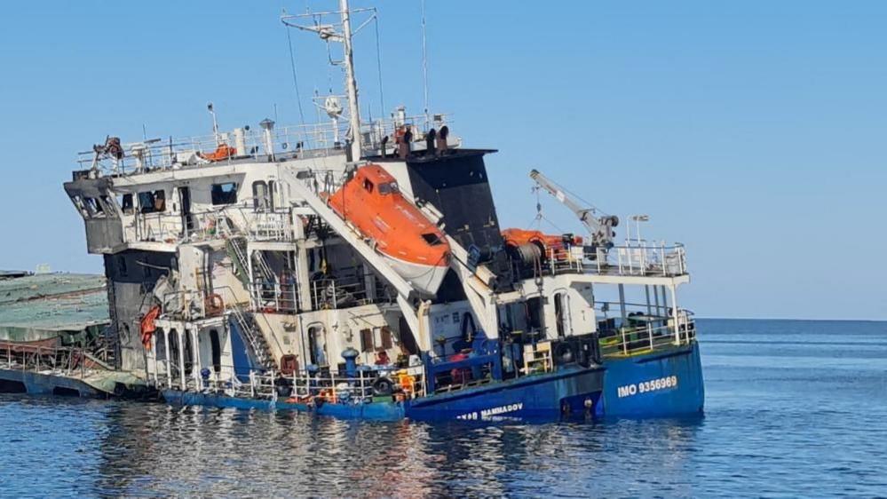 The fire-damaged "Royad Mammadov" ship in the Black Sea after a fire aboard the vessel outside Romania's territorial waters left two people dead and prompted a rescue operation in which others were rescued, in this handout image released on October 5, 2026.