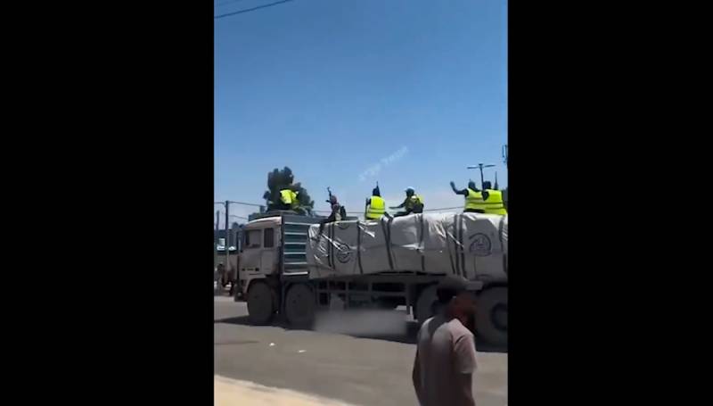 The Real Gaza – Not NAZA - Story 5 Armed men riding on a humanitarian aid truck in Gaza