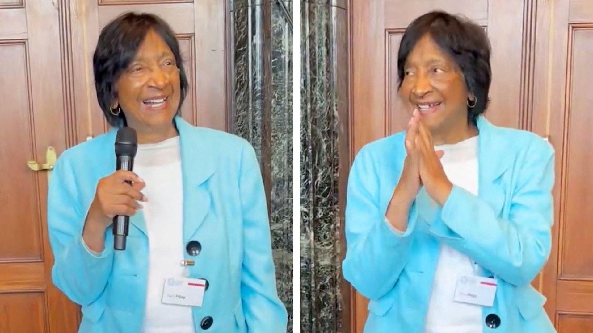 Screengrabs show Navi Pillay smiling, speaking into a microphone and holding her hands together after finding out she had won the Nobel Peace Prize