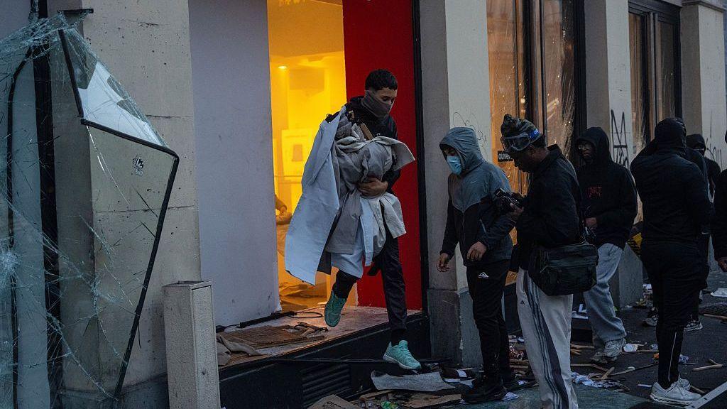 A shop is looted during demonstrations on October 17, 2026 in Paris, France.